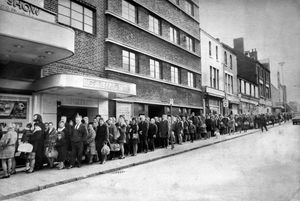 nostalgia pic. Wolverhampton. A queue to see Morecambe and Wise at Wolverhampton in March 1973. This was a print in the Express and Star picture archive at Queen Street, Wolverhampton, and the caption pasted to the back reads: 'Mile long queues revived Beatlemania in Wolverhampton town centre today, as thousands of people besieged the Gaumont Cinema for tickets to see Morecambe and Wise. By lunchtime, hundreds of tickets had gone. And manager Mr Colin Hunter said: 'At this rate, I shouldn't be surprised if the 7,600 seats available were gone by the end of the day.' Mr Hunter and six of his staff worked flat out all morning coping with ticket demands for the two shows on March 30 and 31. An employee added: 'People started queueing at about 9.30 this morning - in 21 years, I've never seen anything like this before.' The print has the Express and Star copyright stamp and a datestamp for March 2, 1973, which will be when taken. The photographer was 'JJ' which will be Johnnie Johnson. The print has stamps indicating it was used as a letters page nostalgia picture on December 13, 2004 and September 4, 2008. Wolverhampton queues. Library code: Wolverhampton nostalgia 2024.