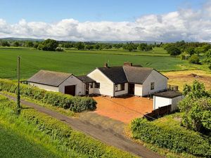 Supporting image for story: Modest bungalow up for sale for £2.3 million thanks to the 176 acres of land with it