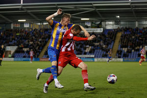 Rob Street of Shrewsbury Town and Jonathan Grounds of Exeter City (AMA)