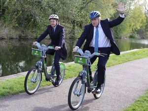 Andy Street and Boris Johnson cycle along the canal in Stourbridge
