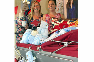 Supporting image for story: Pram at tip forms centrepiece of Church Stretton shop's royal display