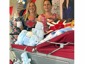 Supporting image for story: Pram at tip forms centrepiece of Church Stretton shop's royal display