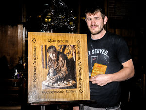 Supporting image for story: Cheers as portrait unveiled by Market Drayton brewery