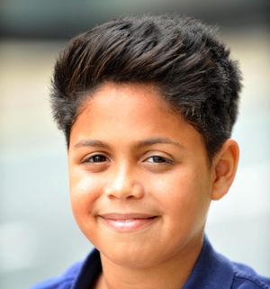 Keelan, aged nine, before he had his head shaved for charity