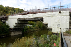 The bridge shrouded in plastic
