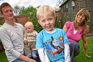 Harry Maceachen with dad Simon, mum Clare and brother Sam