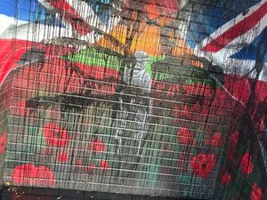 Supporting image for story: Telford tradesman cleans up vandalism after bus stop mural created to honour the dead is defaced for the second time