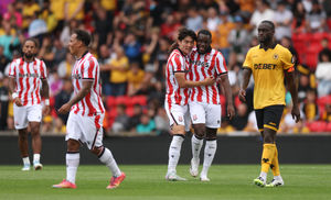 STOKE ON TRENT, ENGLAND - JULY 26: Bae Jun-ho of Stoke City celebrates scoring his team's first goal with teammate Junior Tchamadeu during the pre-season friendly match between Stoke City and Wolverhampton Wanderers at Bet365 Stadium on July 26, 2025 in Stoke on Trent, England. (Photo by Carl Recine/Getty Images)
