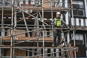 Scaffolding has gone up at Perches House, the scene of a fatal fire in Shrewsbury