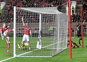 Ryan Bennett celebrates after scoring Wolves's winner against Bristol City (AMA/Sam Bagnall)