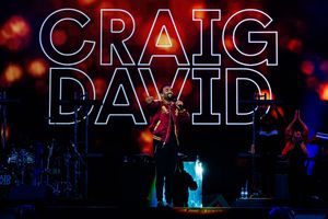 Craig David keeps spirits high during torrential downpours at V