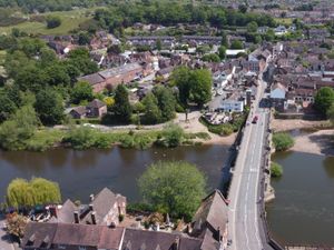 Supporting image for story: Two rescued from river bank after 'slipping down towards water'