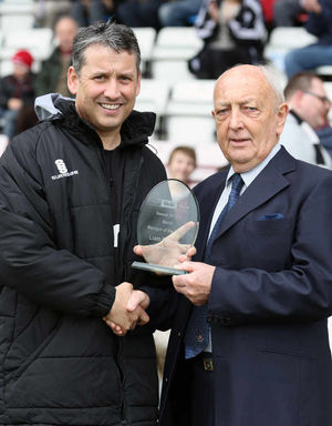 Liam Watson the manager of AFC Telford United receives the Skrill North Manager of the Month Award for March from Brian Lee representing the Football Conference