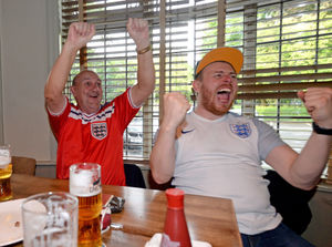 Wild celebrations greet the first goal at the Dog and Gun in Tettenhall
