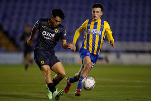 Harry Birtwistle of Wolverhampton Wanderers U21s and Louis Lloyd of Shrewsbury Town. (AMA)