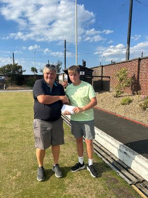 So close – Owen Hanmer receives his Junior Waterloo beaten finalist prize from Mark Sutton