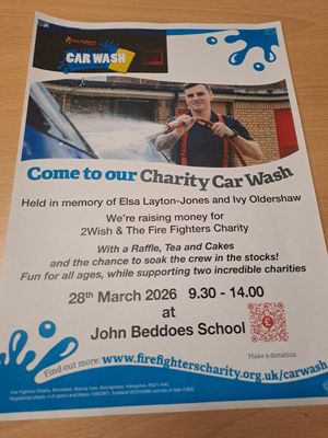 The poster for the charity car wash