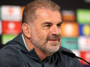 Ange Postecoglou faces the media