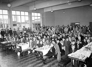 Malinslee Coronation Day celebrations as children enjoy a feast