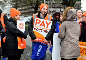 Joe Davies (centre) said a suitable wage should allow him to save for a house and be able to live