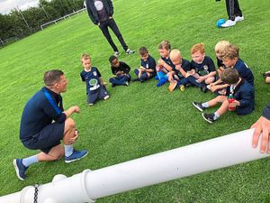 Supporting image for story: Ex-Saddler Wayne Thomas helps kids get their footy fix