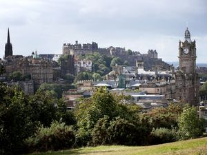 General view of Edinburgh, Scotland, looking towards Edinburgh Castle and the Balmoral Clock.