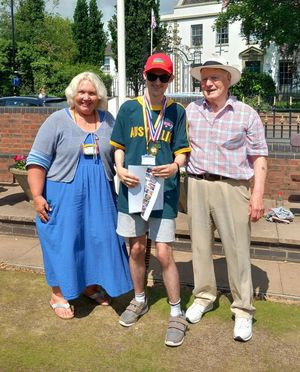 Lyn Evans & Club Captain Brian Lyons presenting awards to students