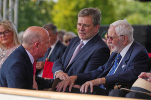 Defence Secretary John Healey (left) speaks to veterans during the national Service of Remembrance, hosted by the Royal British Legion in partnership with the Government, to mark the 80th Anniversary of VJ Day at the National Memorial Arboretum in Alrewas, Staffordshire. Picture date: Friday August 15, 2025. PA Photo. Photo credit should read: Alastair Grant/PA Wire 