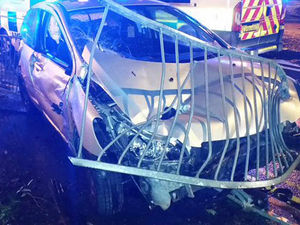 Supporting image for story: PICTURED: Driver arrested after car smashes into railings following police chase