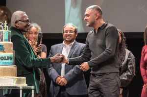 Paz greets Rudolph with a big cake. Rock & Stone 4Tography