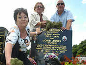 Supporting image for story: Protest over messy cuttings near graves