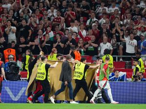 Supporting image for story: Hungary forward Barnabas Varga stable in hospital after going off on stretcher