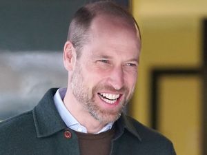 Supporting image for story: William watched by Kenny Dalglish during football match in Liverpool