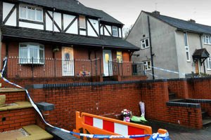 Police tape outside the Lodge Crescent house