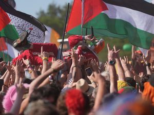 Supporting image for story: Kneecap and Brian Eno call on artists to join syndicate to support Palestine