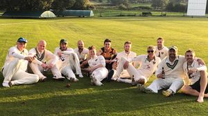 Eugene McCarney, second from right, and his teammates celebrate becoming Shropshire County Cricket League first division champions in 2019