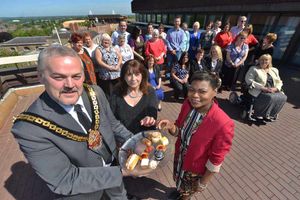 Wolverhampton mayor Ian Brookfield hosts foster carers from the area on his , was hosting Foster Carers from the area on his balcony. At the front with him are Enza Sprio and Sonia Chambers