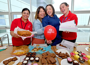Avan Mohammad, Vicky Hinton, Kim Bradley and Emma Dungey-Evans enjoy a laugh and a cake