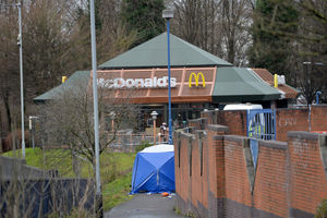 The area around the scene was cordoned off as forensic officers inspected the scene