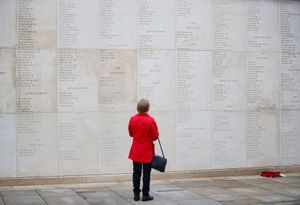 Someone pays their respects at the National Memorial Arboretum in Alrewas, Staffordshire