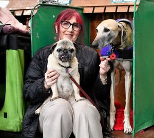 Heidi Woodgate with her dogs Jeffrey and Yoski at Crufts 2025