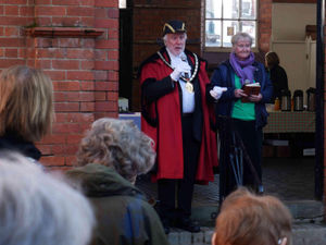 Kington Mayor Councillor Philip Sell speaks to the crowds. Image by Andy Compton