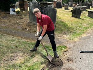 Year Student Fin Hinton tidying up St Michael's Graveyard in Penkridge