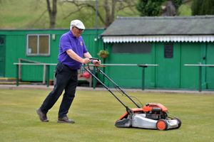 Members of the club spent hours throughout lockdown ensuring the green would be fit for purpose upon the club's reopening. In shot is secretary Mervyn Jarman