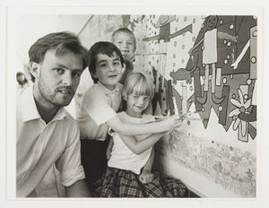 Green Close Primary School, Shelfield, Walsall. Pupils and parents painted a mural onto the wall of a corridor in the infants section of the school, with the help of Andy Bradley of the Fordbrook Community Office and Pelsall Community School. Mark Gallagher is quoted. The photograph shows Andy Bradley with David Erfani, Debbie Huntstone and Robert Troke.