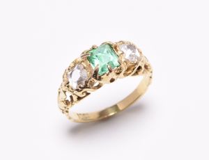 A 19th century three stone emerald and diamond ring sold for £1,000.