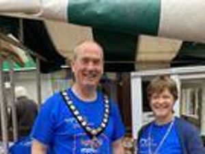 Supporting image for story: Mayor turn's market trader for his charity