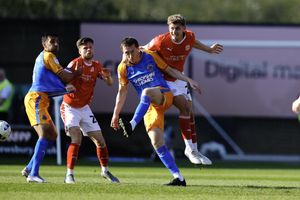 Tom Anderson clears for Shrewsbury Town 