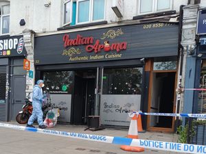 Supporting image for story: Boy, 15, and man, 54, bailed after arrest following fire at Ilford restaurant