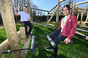 New play equipment, getting a test run from 10-year-olds Alec and Mansirat.